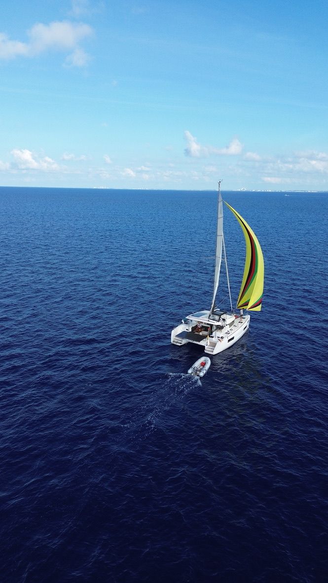 Aerial view of Laurelli sailing with the gennaker up